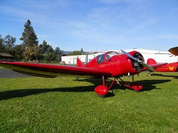 The Dart Model G gets pushed out of the hangar at the Western Antique Aeroplane and Automobile Museum.