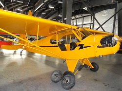 See a 1940 Piper J-3 Cub at the Western Antique Aeroplane and Automobile Museum.