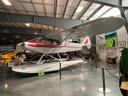 WAAAM's Piper Super Cub is on floats while on display in the museum.