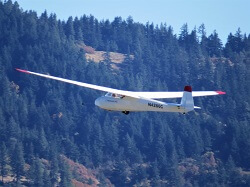 WAAAM's 1964 Schleicher Ka7 Rhonalder being towed up for a flight around the Hood River Valley. 