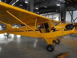 See a 1938 Taylor J-3 Cub at the Western Antique Aeroplane and Automobile Museum.