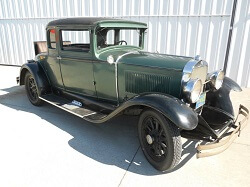 WAAAM's 1929 Studebaker Commander outside of the museum.