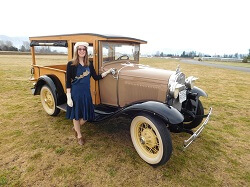 WAAAM's Assistant Director Stephanie Hatch ready to drive their 1930 Ford Model A Huckster.