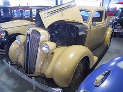 WAAAM's 1936 Plymouth Coupe with the hood up.