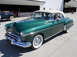 WAAAM's 1950 Oldsmobile 88 out for a drive with Assistant Director Stephanie Hatch