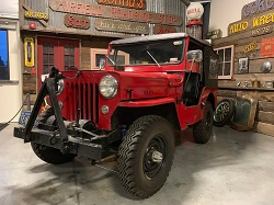 WAAAM's 1955 Willys CJ3B on display in the photo corner at the museum.